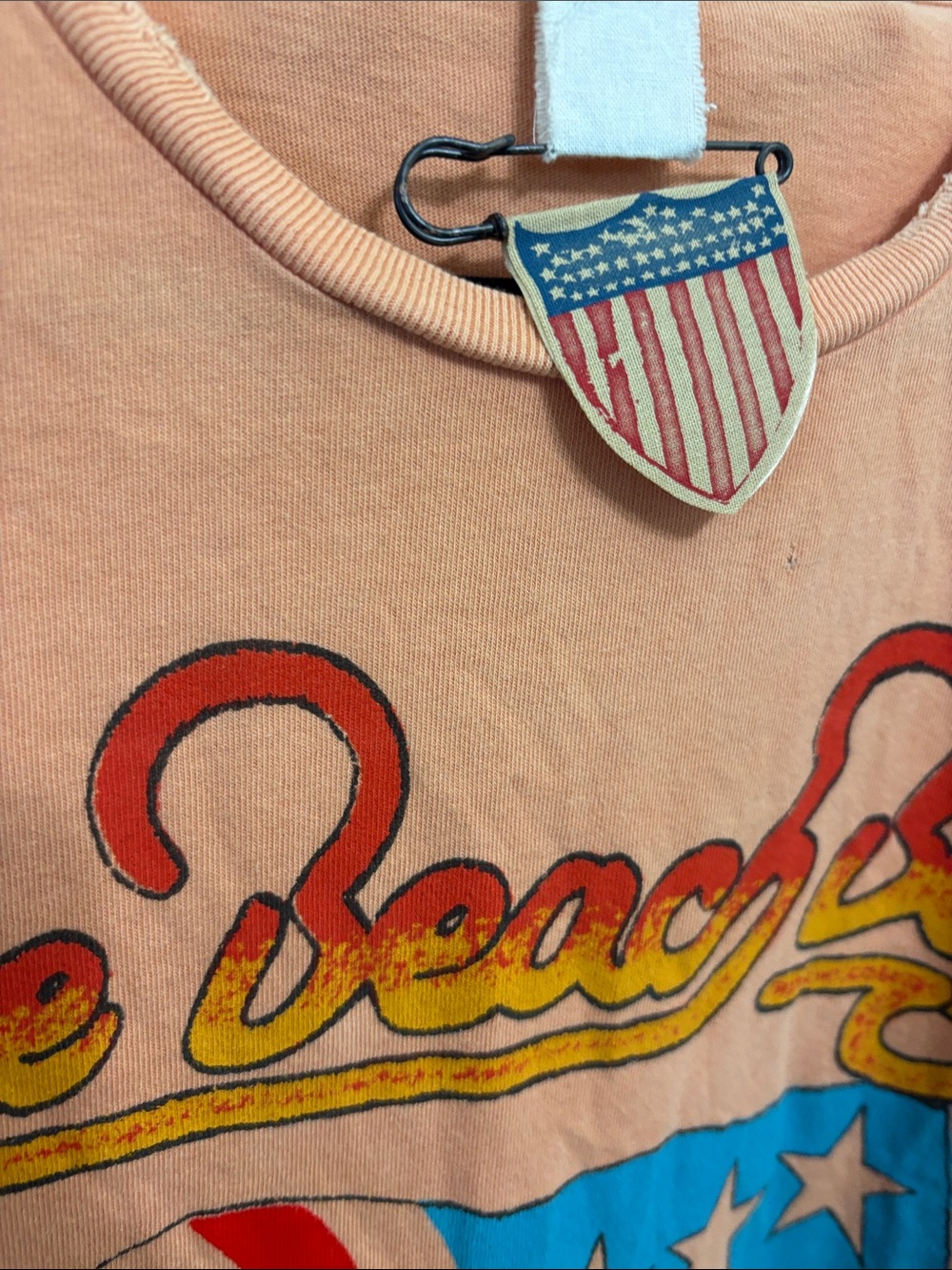 MadeWorn The Beach Boys Graphic Tee in Peach with Red, Blue and Yellow Print - Picture 6 of 6